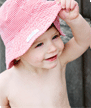 Paddle childrens swimwear - boys red bucket hat photo